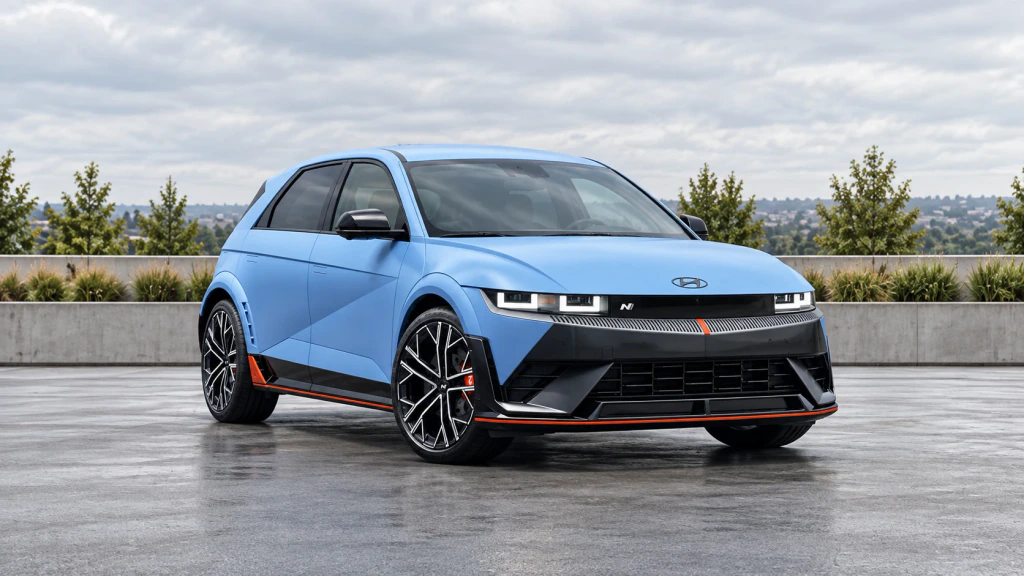 Representative light-blue Hyundai Ioniq 5 N five-door, with dark N wheels and orange-red lower trim.